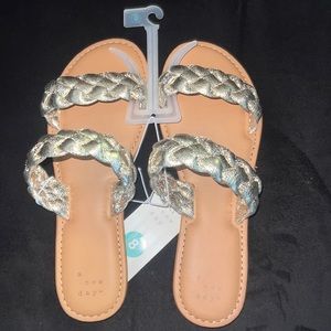 A New Day slide sandals in gold. Size 8.